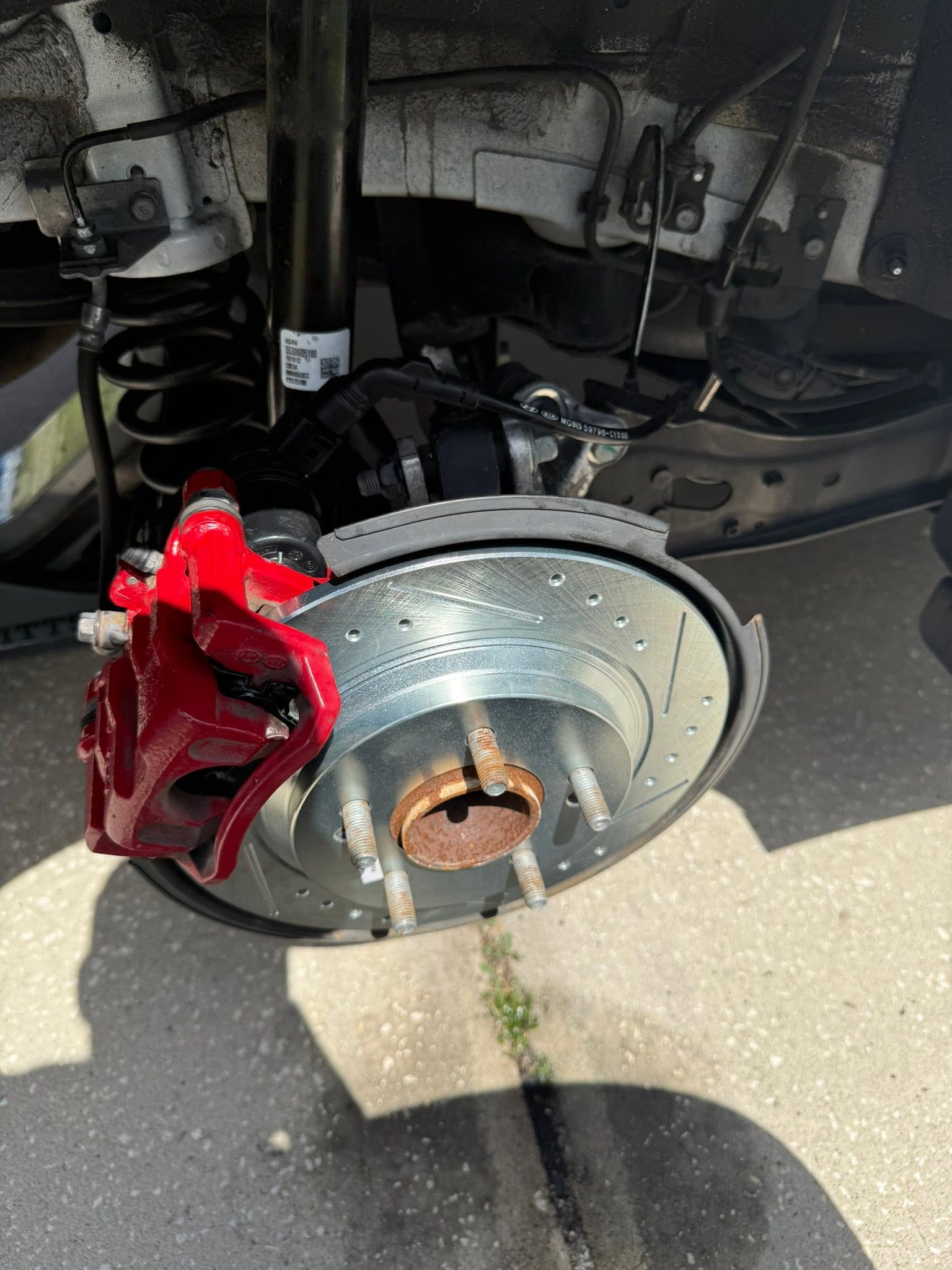 New brake rotor and caliper